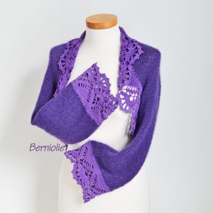 Purple shrug with lace trim. N384