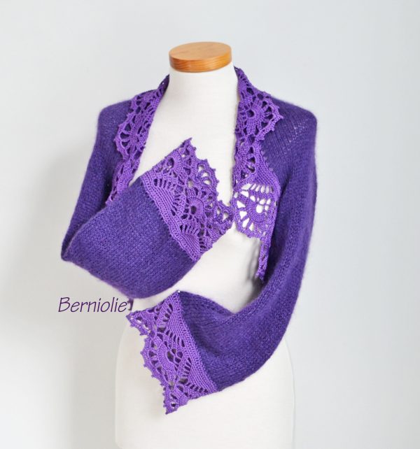 Purple shrug with lace trim. N384