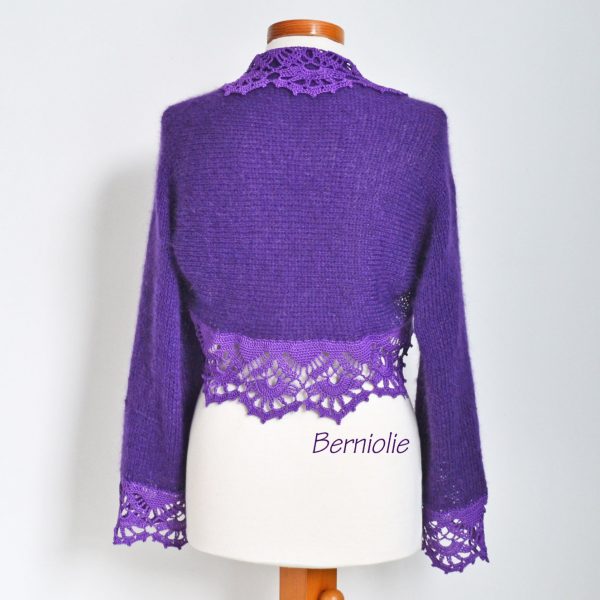 Purple shrug with lace trim. N384